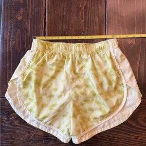 Nike Women's Pastel Yellow Athletic Shorts